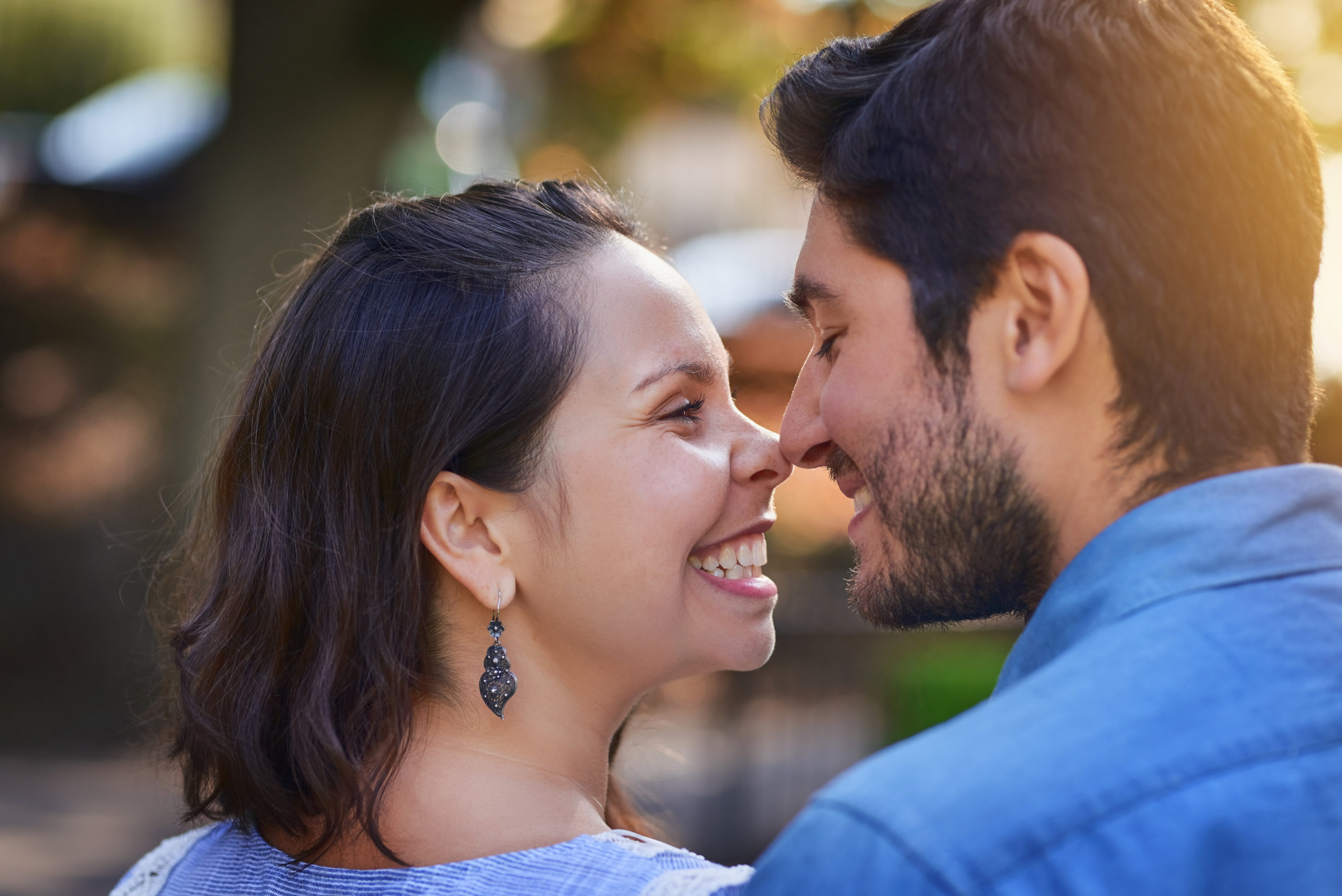 Young happy couple embracing each other and experiencing twin flame love.