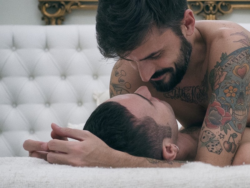 an attractive gay couple enjoying a gay hookup